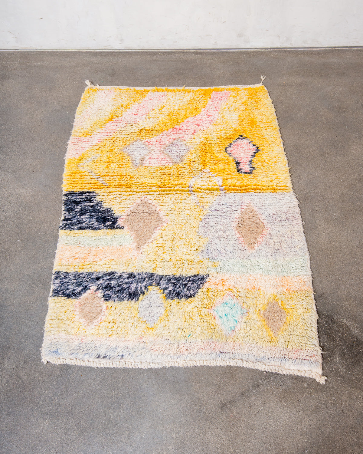 Modern, designer, handcrafted Berber rug from Morocco. Vintage carpet with beautiful colours and patterns and fluffy texture.